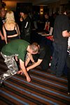 Dave trying to swap shoes with Mark from Illuminatus